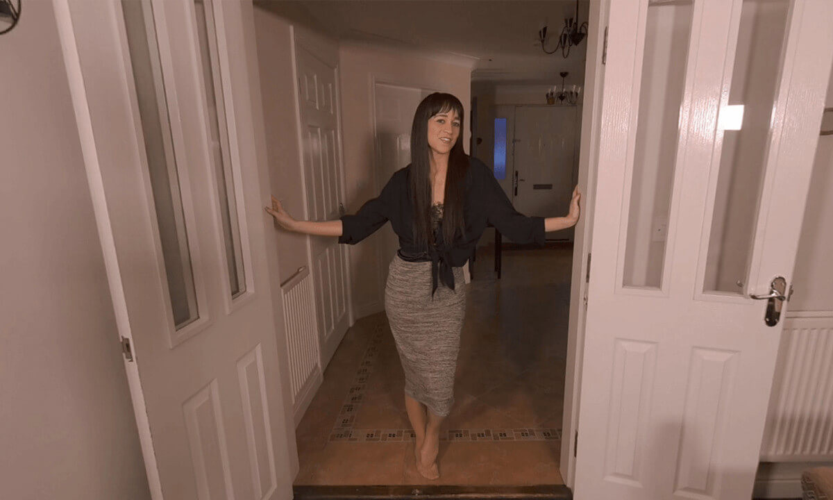 Sexy Story - British Brunette Striptease in the Hallway Slideshow